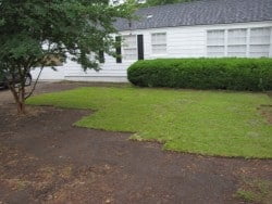 one pallet of sod laid out by a house