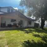 Reviewer's third photo of his back yard with fresh sod grass